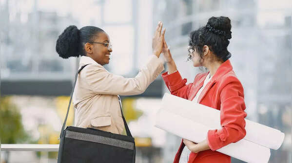 Confident person celebrating other's success